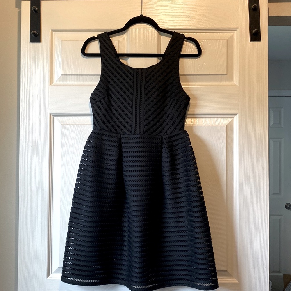 Cute black cocktail or formal dress. New with tags.